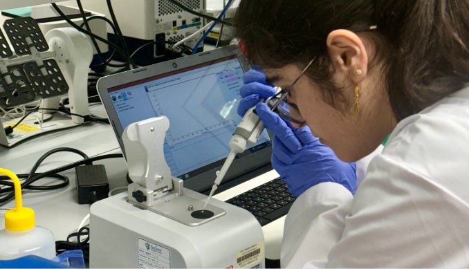 Participants conducting lab experiences