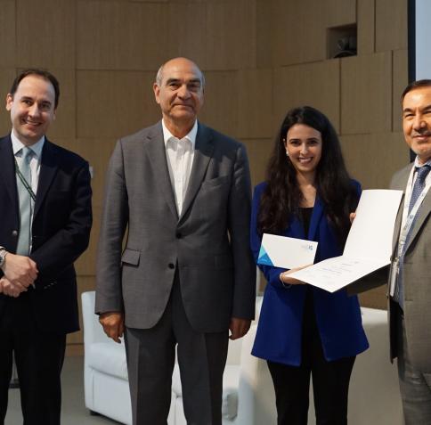 Safae Bouyahyaoui, MA in Intercultural Communication (second from right), receives the first place award from HBKU CHSS faculty.